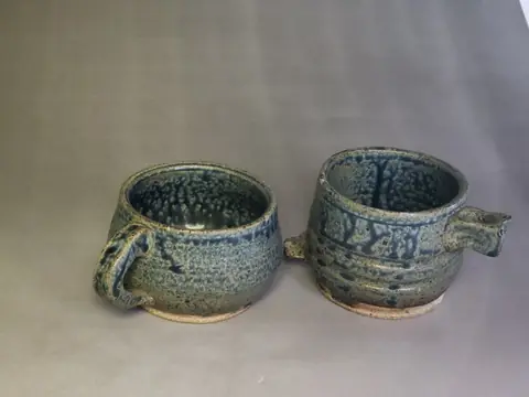 Blue glazed cup pair