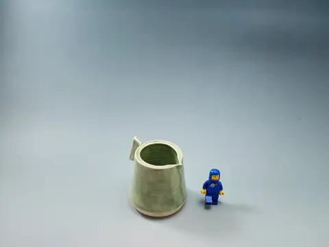 Small green pitcher