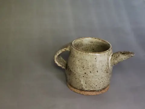 Speckled small pitcher